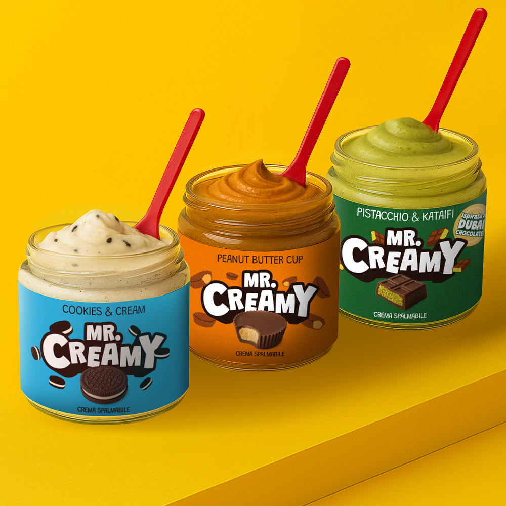 3 confezioni, le più vendute, di creme spalmabili da 200g Mr Creamy. Nella foto mani che reggono pistacchio e kataifi, cookies and cream e peanut butter cup